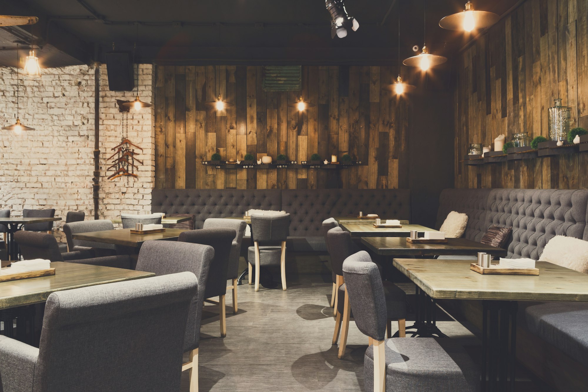 Cozy wooden interior of restaurant, copy space